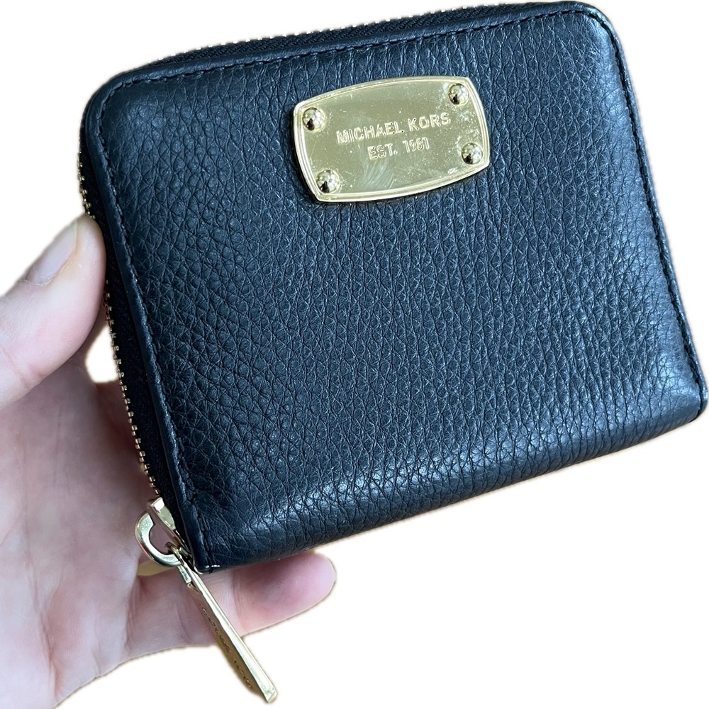 Michael Kors Compact Black Pebbled Leather Wallet with Gold-Tone Hardware.